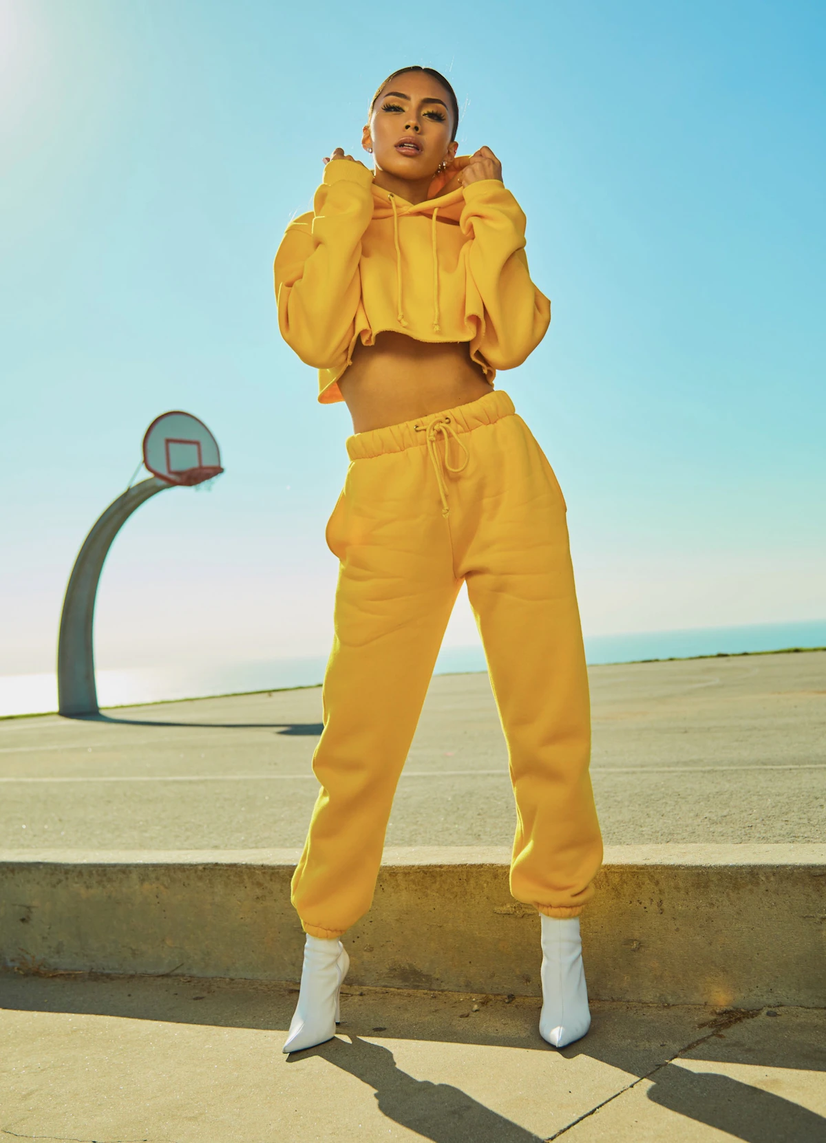 A clothing photography shoot against a neutral background showing fabric drape and garment shape clearly