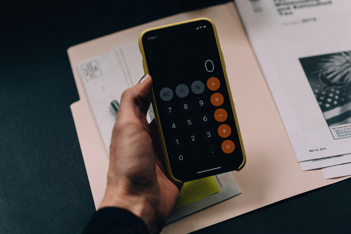 A Shopify product admin page showing the charge tax toggle, tax code and product type fields being configured